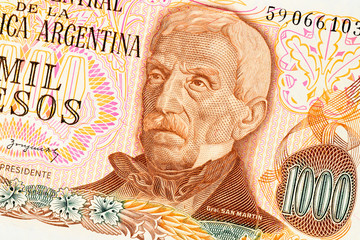 Part of old one thousand pesos Argentina banknote background. High resolution vintage photo of front side argentinian bill, close up macro.