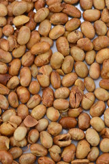 peanuts on a wooden platter