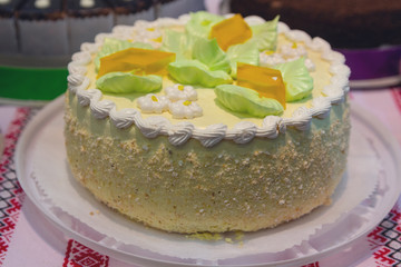 Beautiful delicious cake with biscuit cream and nuts. Dessert