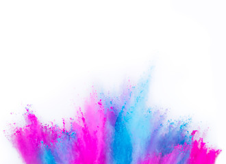 Multi colored powder explosion isolated on white