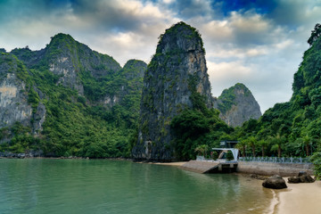 Naklejka premium Ha Long Bay Vietnam. Famous travel nature destination. Green mountains in the water. Islands landscape at Halong