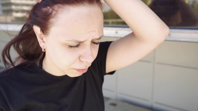 The girl became ill on the street, she feels unwell. Food poisoning