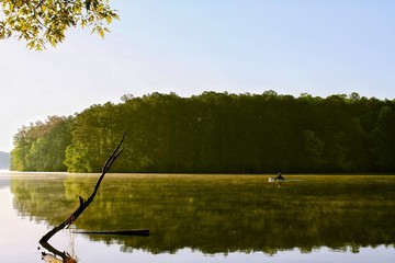 Lone kayak on a lake.
