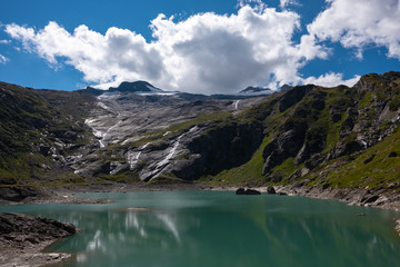 Beautiful scenery of Basodino glacier next to Lago del Zött in Ticino, Switzerland