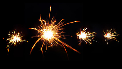 Set of different sparklers. Bengal fire on black background