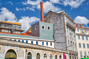 Colorful buildings of Lisbon historic center near landmark Rossio Square