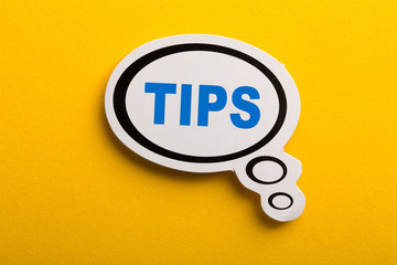 Tips Speech Bubble Isolated On Yellow Background