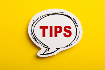 Tips Speech Bubble Isolated On Yellow Background