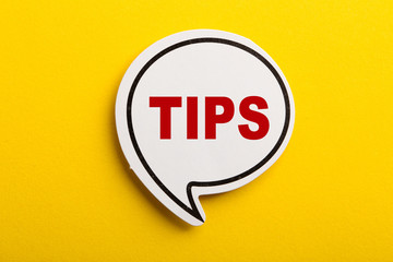 Tips Speech Bubble Isolated On Yellow Background
