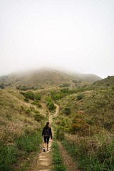 Girl Walking down Mountain