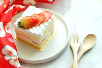Close up of Strawberry shortcake on white plate