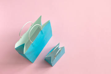 Recycle paper bag isolated on pink background. Mockup for design