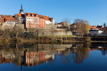 Fototapeta na wymiar Sunny winter royal medieval Town Pisek with the Castle above the river Otava, Czech Republic 