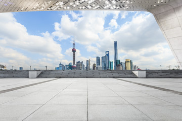 Empty square floor and lujiazui financial district cityscape in Shanghai