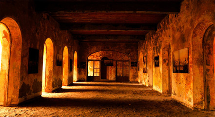 Fototapeta na wymiar exhibition building on the island of Gorée, Senegal, special light and pictures on the walls
