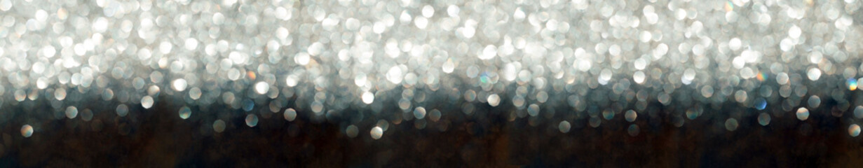 black and white glitter texture abstract background. Bokeh circles for Christmas background