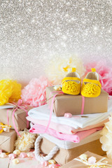 Its a girl, pink theme Baby Shower. Close-up of baby shoes