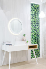 Interior of bathroom with washbasin faucet and white towel. Modern design of bathroom.