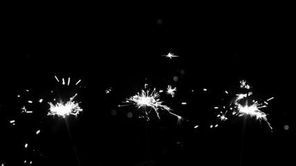 Set of Bengal light. Realistic Sparkler Lights Isolated, black background. Black and white color. Festive bright fireworks. Element of decorations for celebrations and holidays.