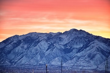Sunrise of Winter panoramic, view of Snow capped Wasatch Front Rocky Mountains, Great Salt Lake...