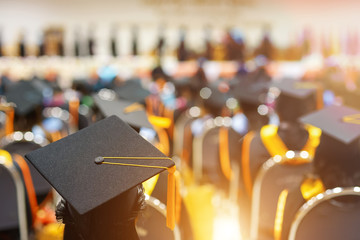 Rear view of the graduate in graduation day. Soft focus back view of the graduates in the...