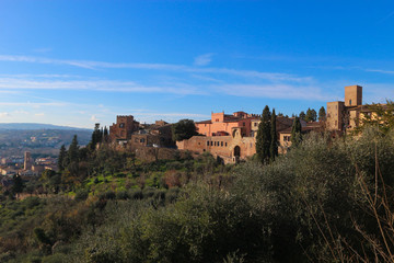 Fototapeta premium Scenic view of little cosy tuscany Certaldo old town in winter sunny day, italy
