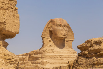 view on Great Sphinx through ancient stones nearby, Egypt