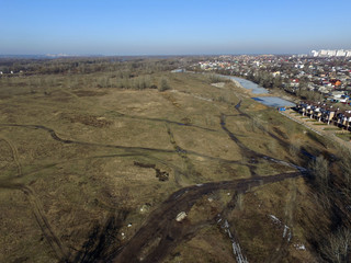 Fototapeta na wymiar Aerial view of the Saburb landscape at winter time (drone image).Near Kiev,Ukraine
