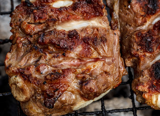 Grilled pork ribs on the grill steak.