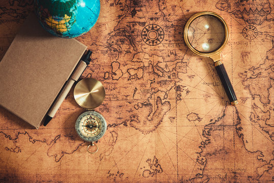 Navigation Explore of Journey Planning With Compass and Magnifying Glass Layout on World Map Background., Expeditions Investigate of Treasure or Travel Touring Destination Concept.