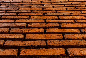 Old red brick wall background.