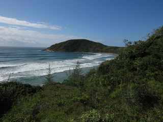  Beach, rocks, crystal clear water, trails, natural water pools, green plants and sun.