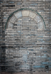 Rough Brick wall dark stone grunge Door and window pattern texture background.