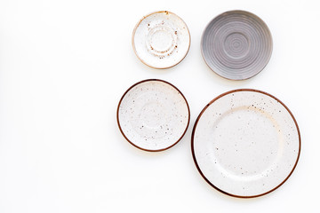 Mockup with plates. Empty ceramic plates on white background top view space for text