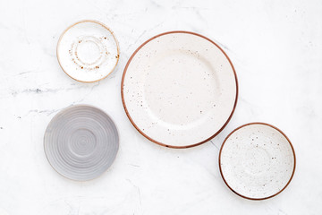 Mockup with plates. Empty ceramic plates on white background top view space for text
