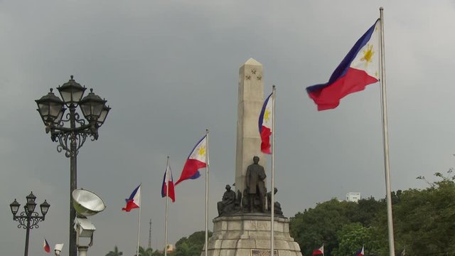 Philippine Flags at Rizal Monument in Manila Philippines