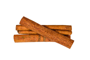 Brown cinnamon sticks isolated on a white background