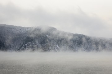Foggy morning on the Yenisei river in winter near Krasnoyarsk in Siberia, Russia