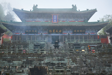 Ancient kungfu Temple in Wudangshan mountain on fog