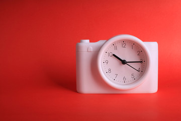Clock on red background