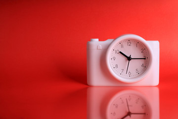 Clock on red background