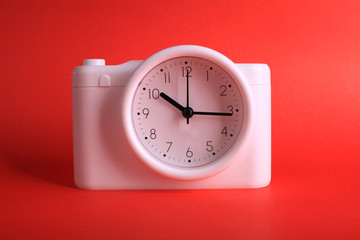 Clock on red background