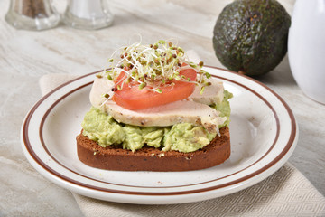 Chicken avocado sandwich on gluten free toast