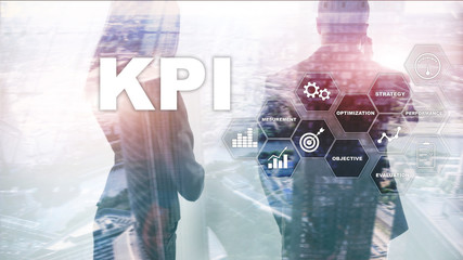 KPI - Key Performance Indicator. Business and technology concept. Multiple exposure, mixed media. Financial concept on blurred background.