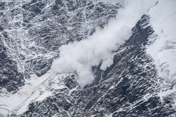 snow avalanche in mountains