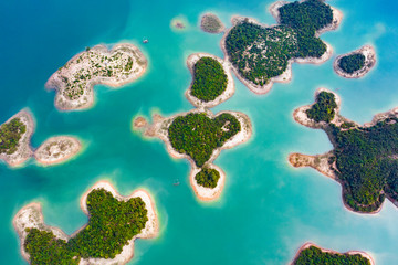 (View from above) Stunning aerial view of a heart-shaped island in the middle of a group of other islands in Nam Ngum Reservoir in Thalat located in northern Laos.