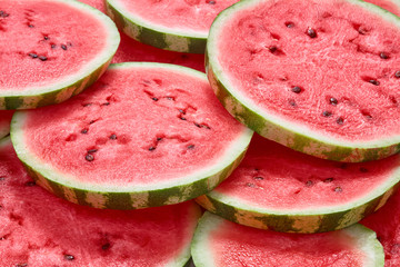 slices of watermelon on white background