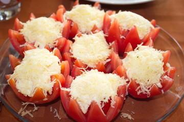 Tomato baskets with cheese filling