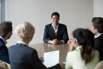 Smiling african male applicant feeling confident prepared to get job