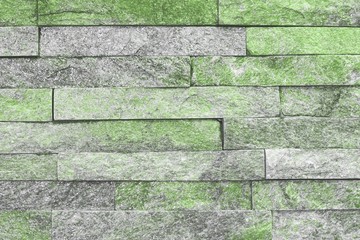 creative aged green natural quartzite stone bricks texture for background use.